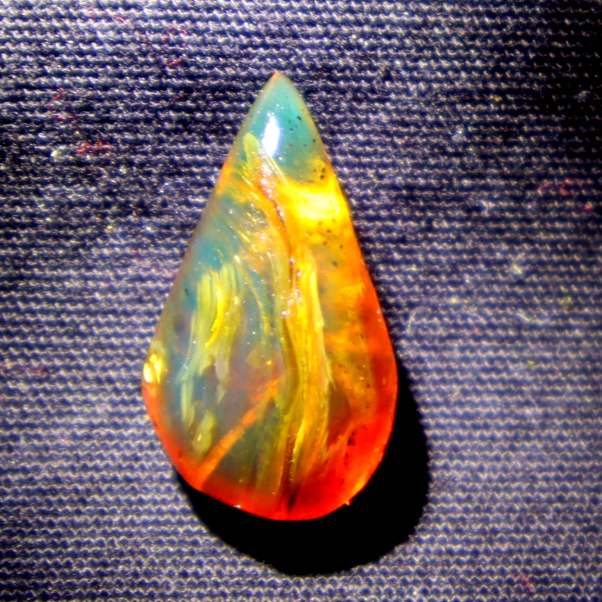 Translucent red blue Natural Dominican Amber teardrop Polished Stone 24 mm