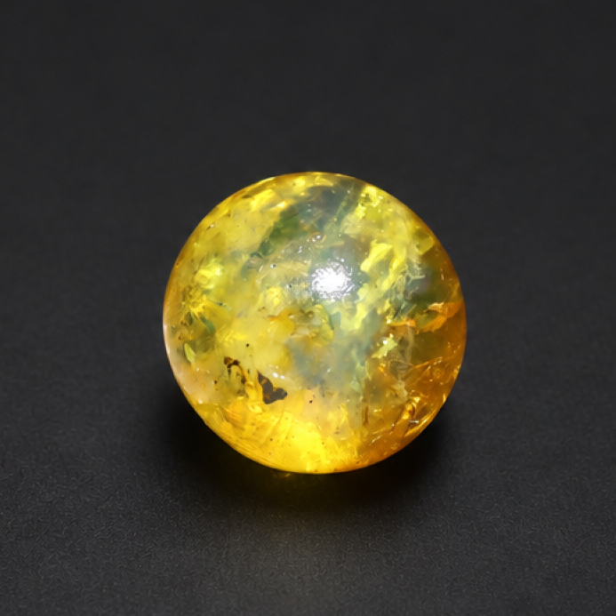 Untreated olive green yellow Dominican amber sphere/ball 18.7mm